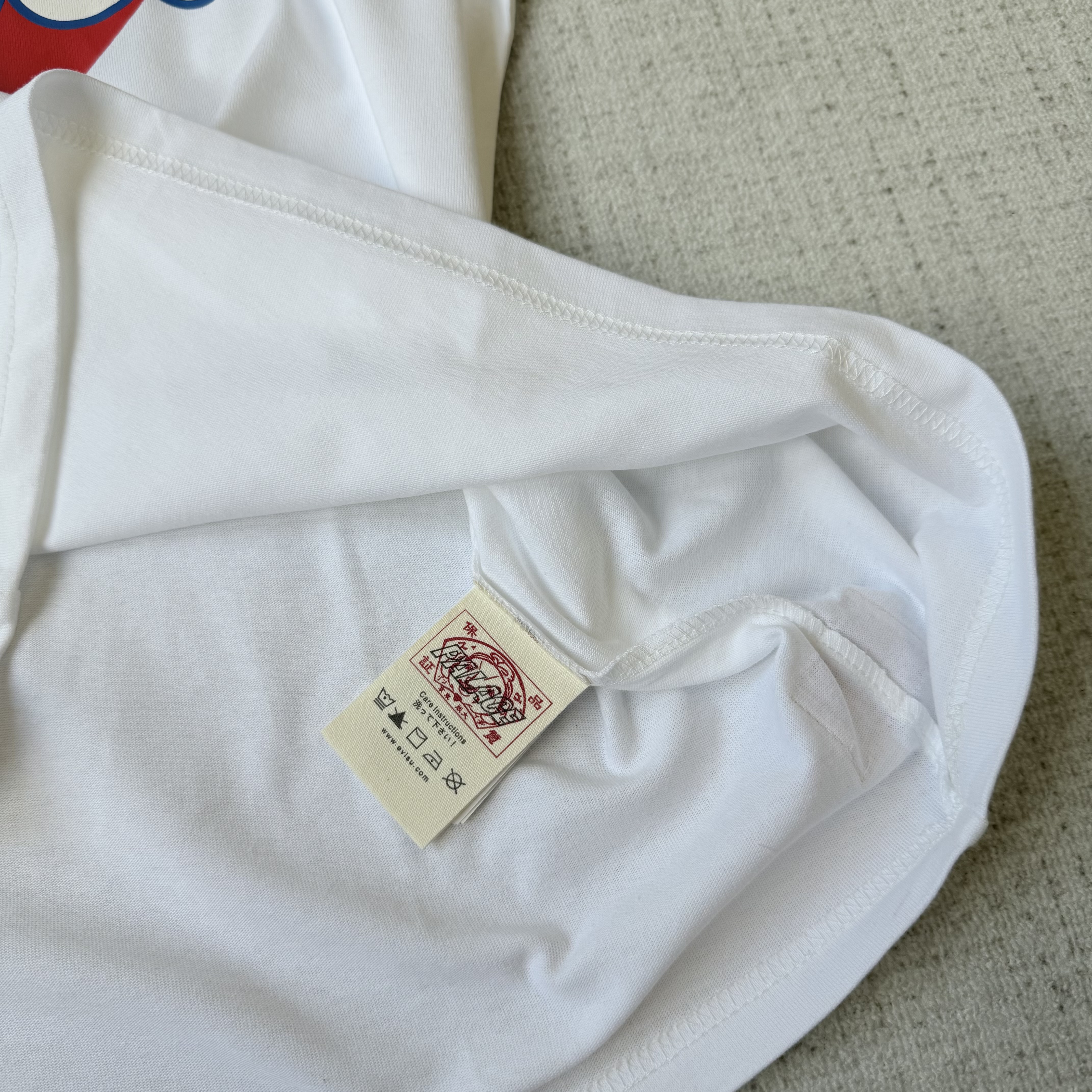 PA x EVISU tee - Image 11